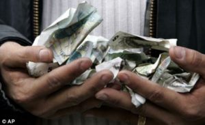 image of cash in hand