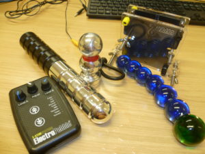 Image of Electrosex Power box and assorted E-stim electrodes