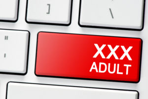 Image of computer keyboard with XXX ADULT key