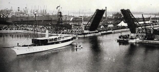 The then Royal Yacht passing through bascule bridge at the opening of London's King George V Dock in 1921